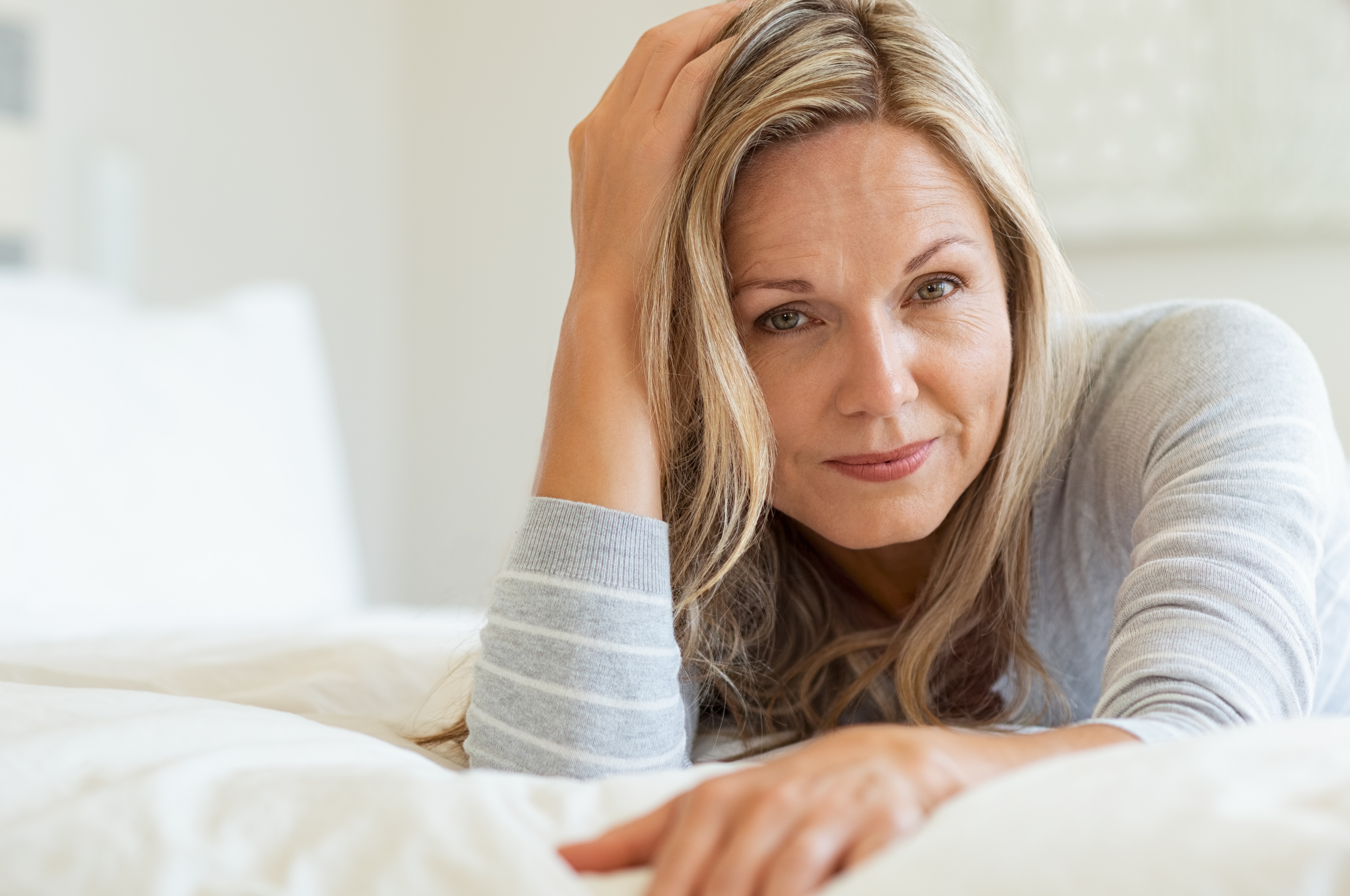 mature-woman-relaxing-bed.jpg mature-woman-relaxing-bed.jpg