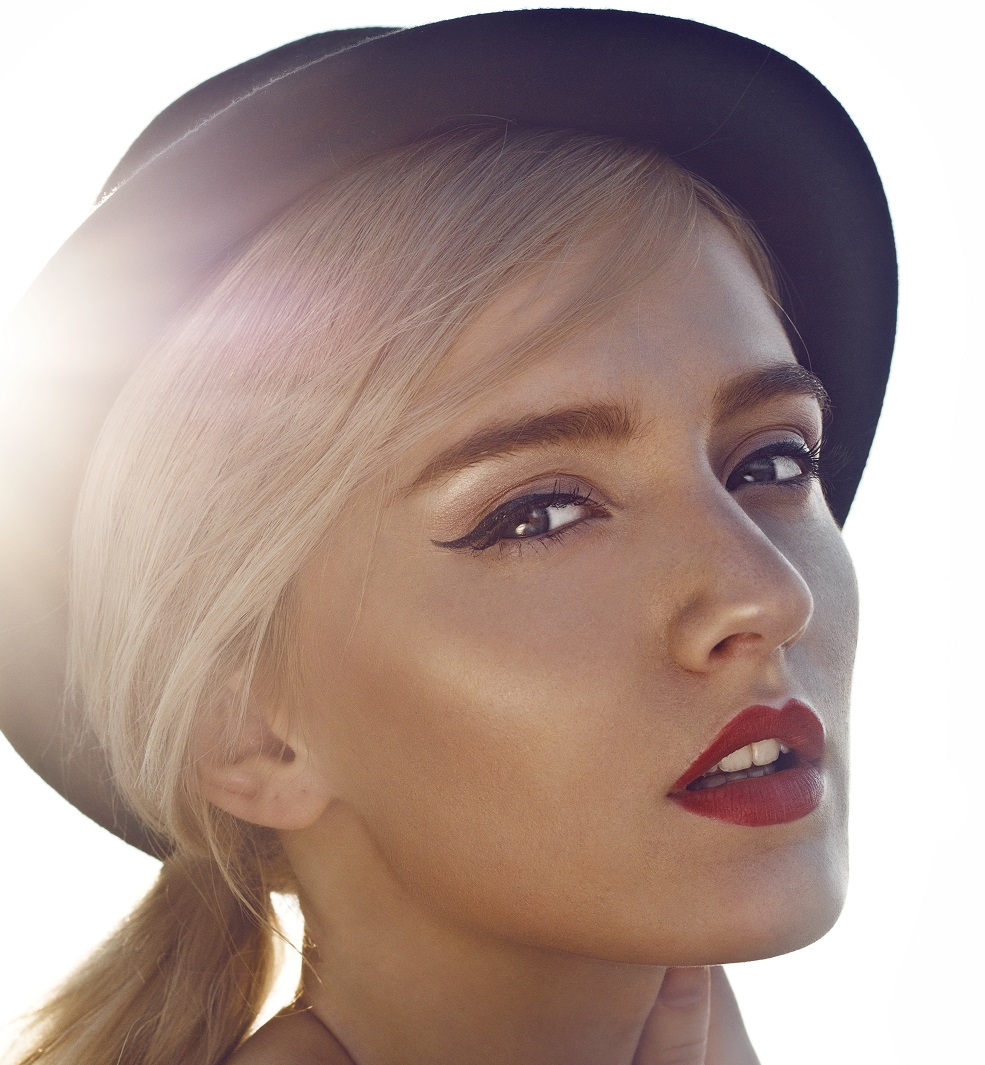 Portrait of beautiful young woman on the rooftop.