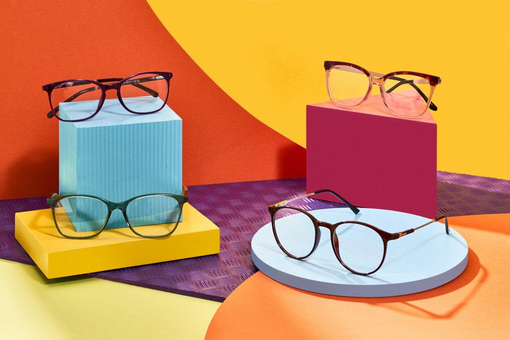 4 Glasses frames displayed against colourful background