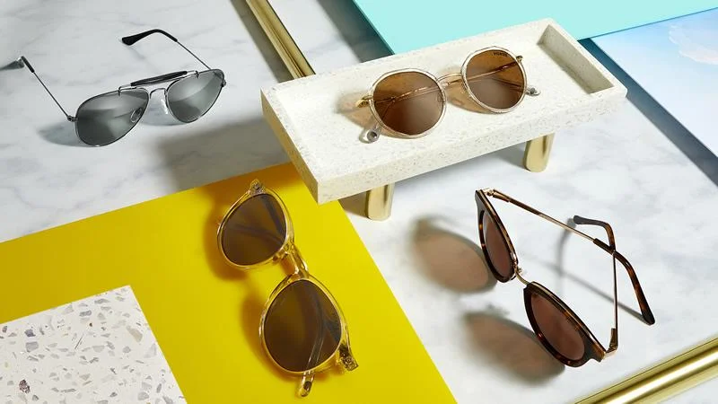 Sunglasses displayed with colourful background