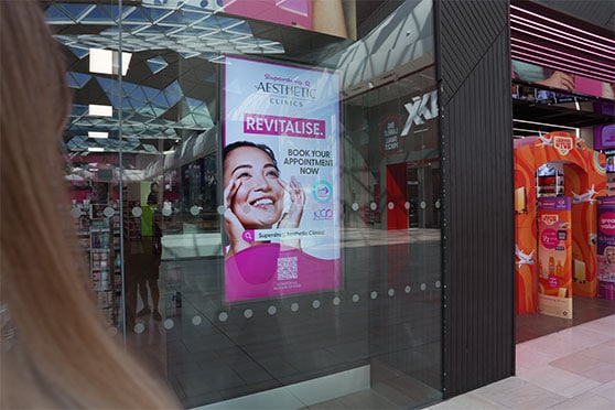 Optimo window screen viewed from outside a Superdrug store.